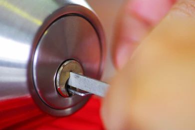 closeup-hands-locksmith-using-metal-260nw-479993032.jpg